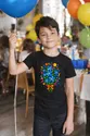 Koszulka w kwiaty niezapominajki dla chłopca czarna geometryczne kształty, zdjęcie 5