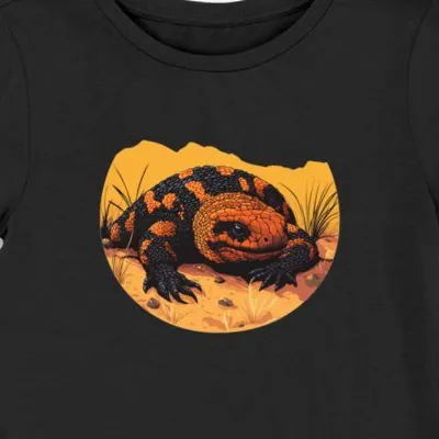 Koszulka damska czarna z motywem pomarańczowych i czarnych łusek gila monster